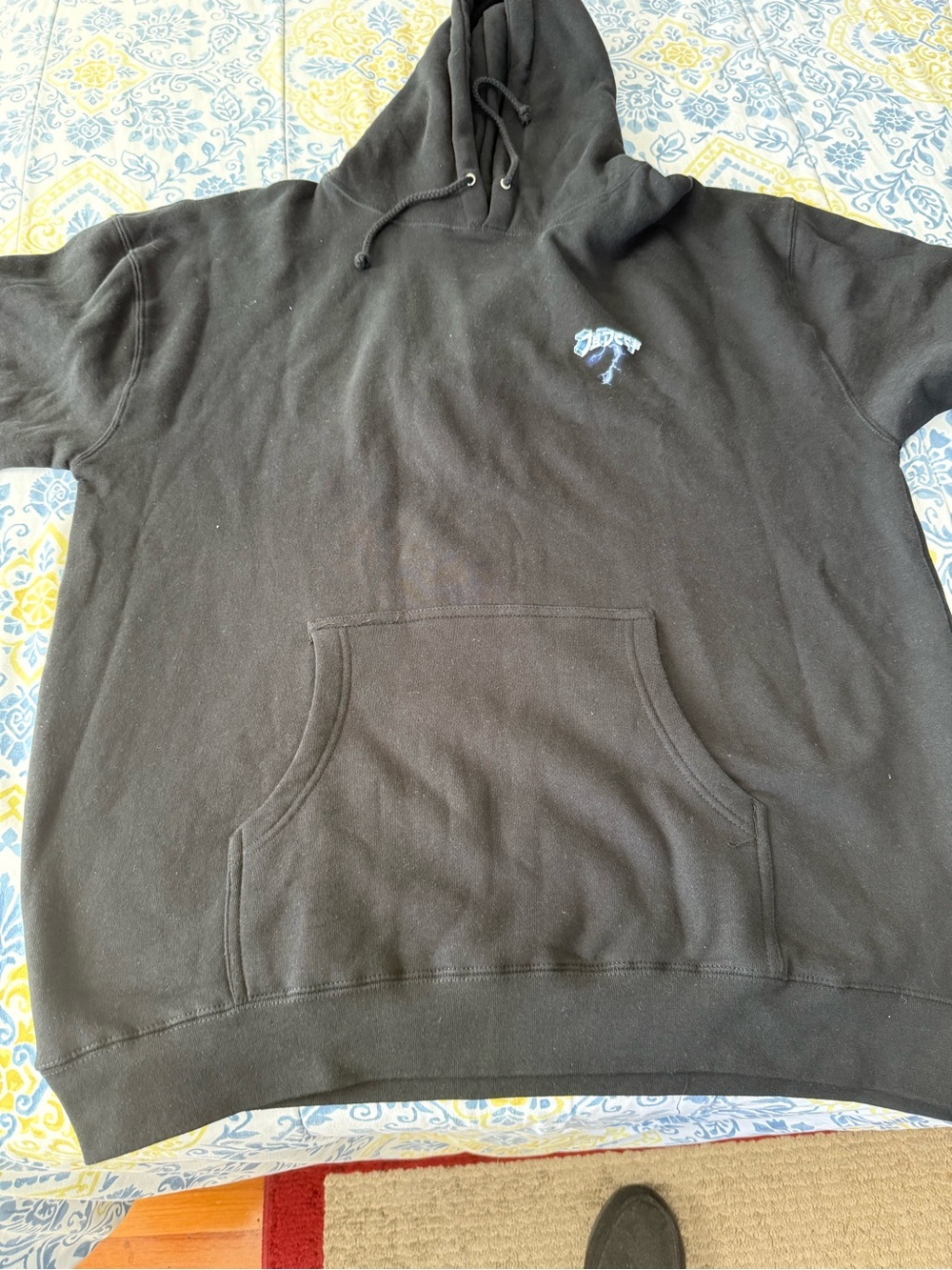 10.Deep Men’s Black Hoodie with Small Blue Chest Logo